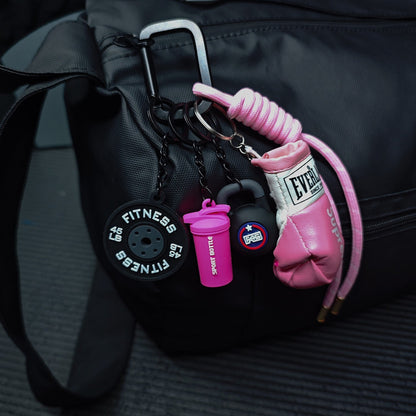💪🔥 ¡Da rienda suelta a tu espíritu gimnástico allá donde vayas! Set de llaveros para amantes del fitness 🔥💪